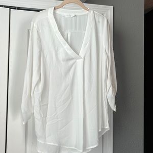 $20 High low sheer slightly off white light cream blouse size L